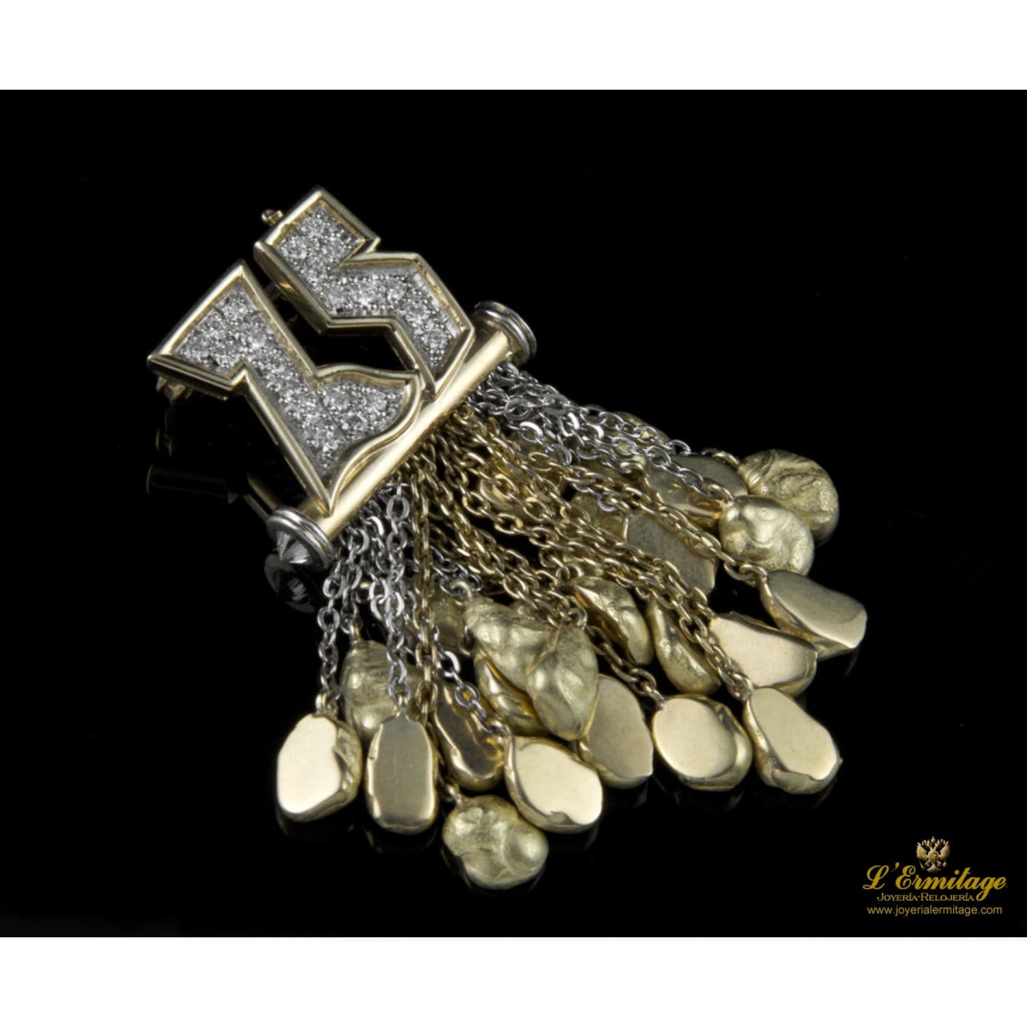 Broche-alfiler oro amarillo, pepitas de oro y diamantes.